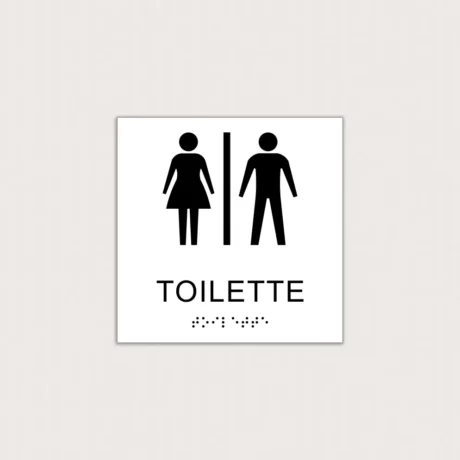 Ein weißes taktiles Schild für Toiletten mit Brailleschrift